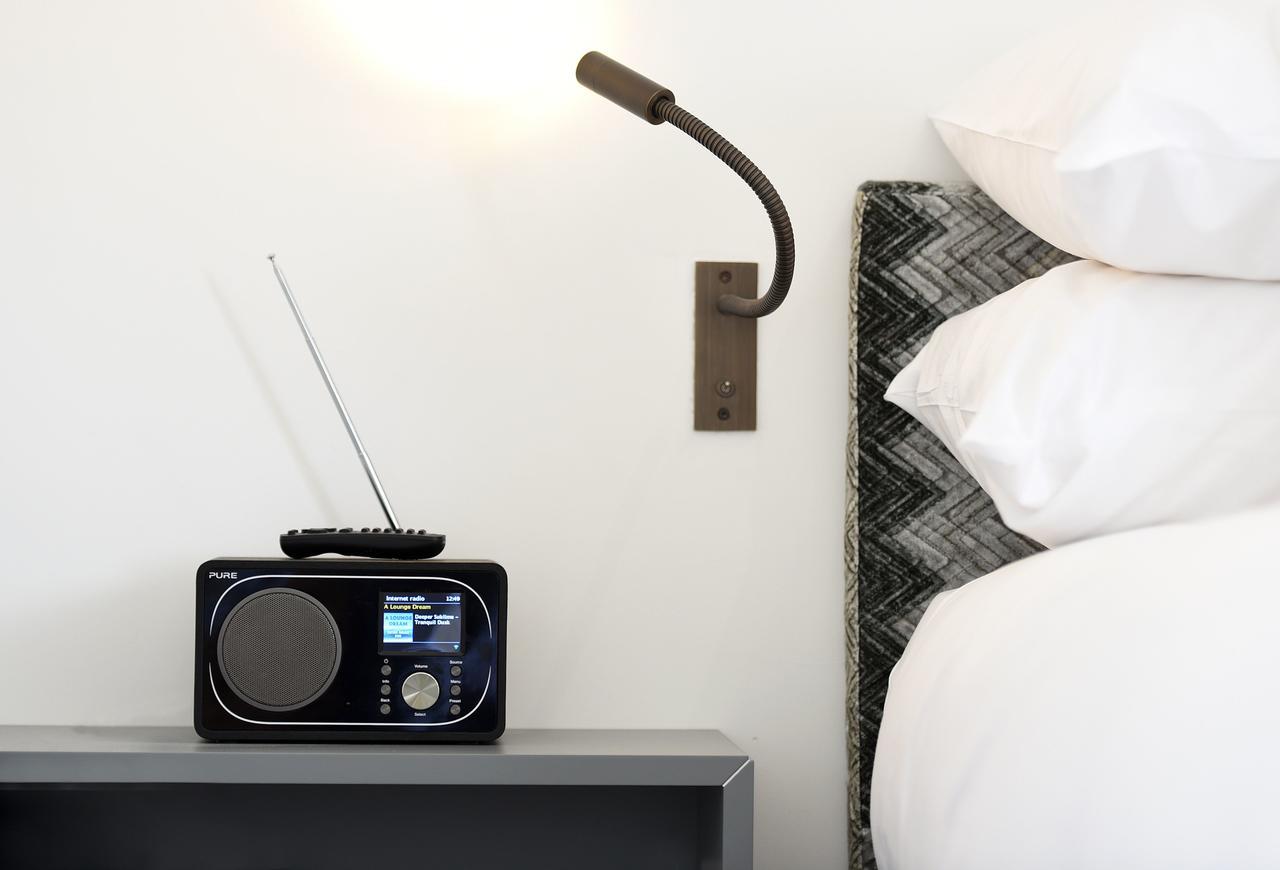 Tuddenham Mill Luxury Hotel Exterior photo A wall mounted reading light