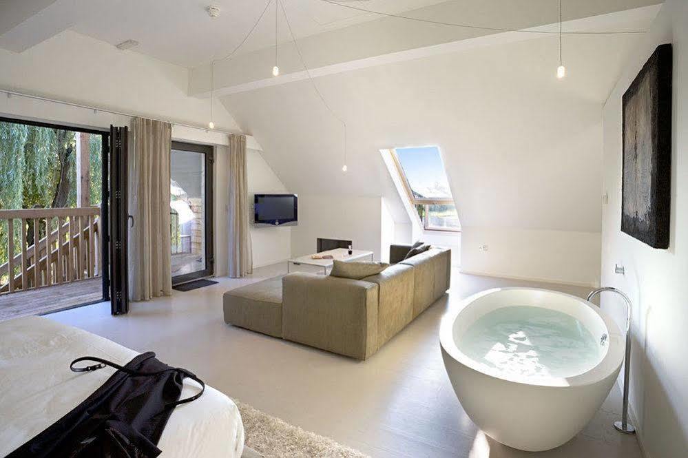 Tuddenham Mill Luxury Hotel Exterior photo A suite at the hotel